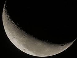 Thin Waning Crescent Moon with binoculars