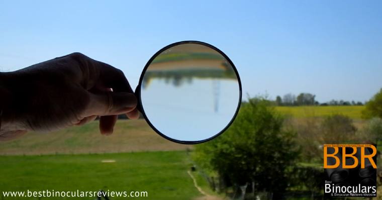 Upside-down Image created when looking through the lens on a magnifying glass