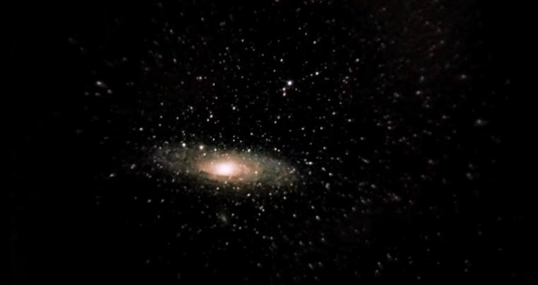 Andromeda galaxy photo taken with 7x50 binoculars and a mobile phone 