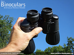 Me holding the Levenhuk Atom 10x50 Binoculars