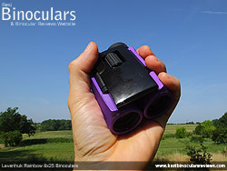 Holding the Levenhuk Rainbow Binoculars