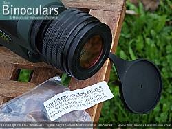 Color enhancing filter and the Objective Lens Cover on the Luna Optics LN-DM60-HD Digital Night Vision Monocular & Recorder mounted on a tripod