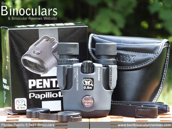 Pentax Papilio 8.5x21 Binoculars with neck strap, case and rain-guard