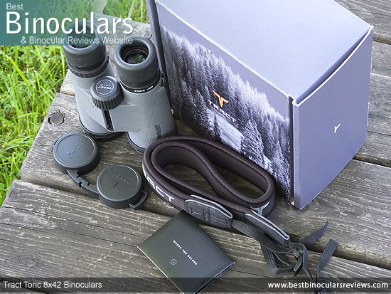 Tract Toric 8x42 Binoculars with neck strap, carry case and lens covers